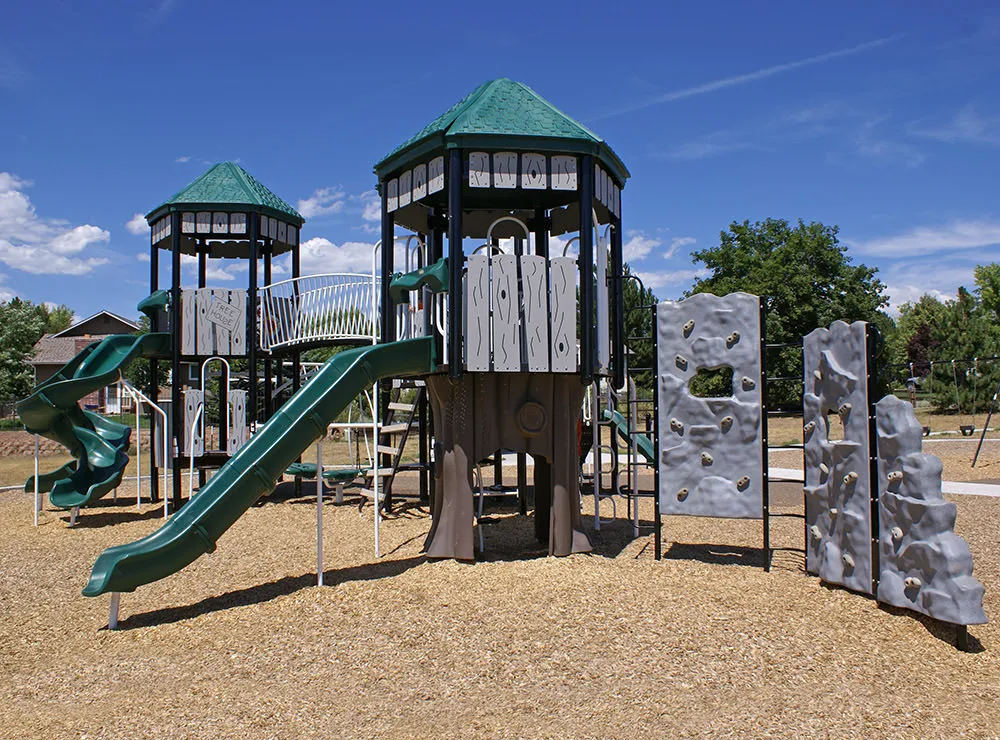 Bridge connecting playground equipment at Columbine Hills